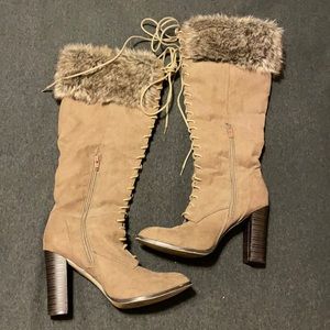 Knee high lace up heeled boots with fax fur top